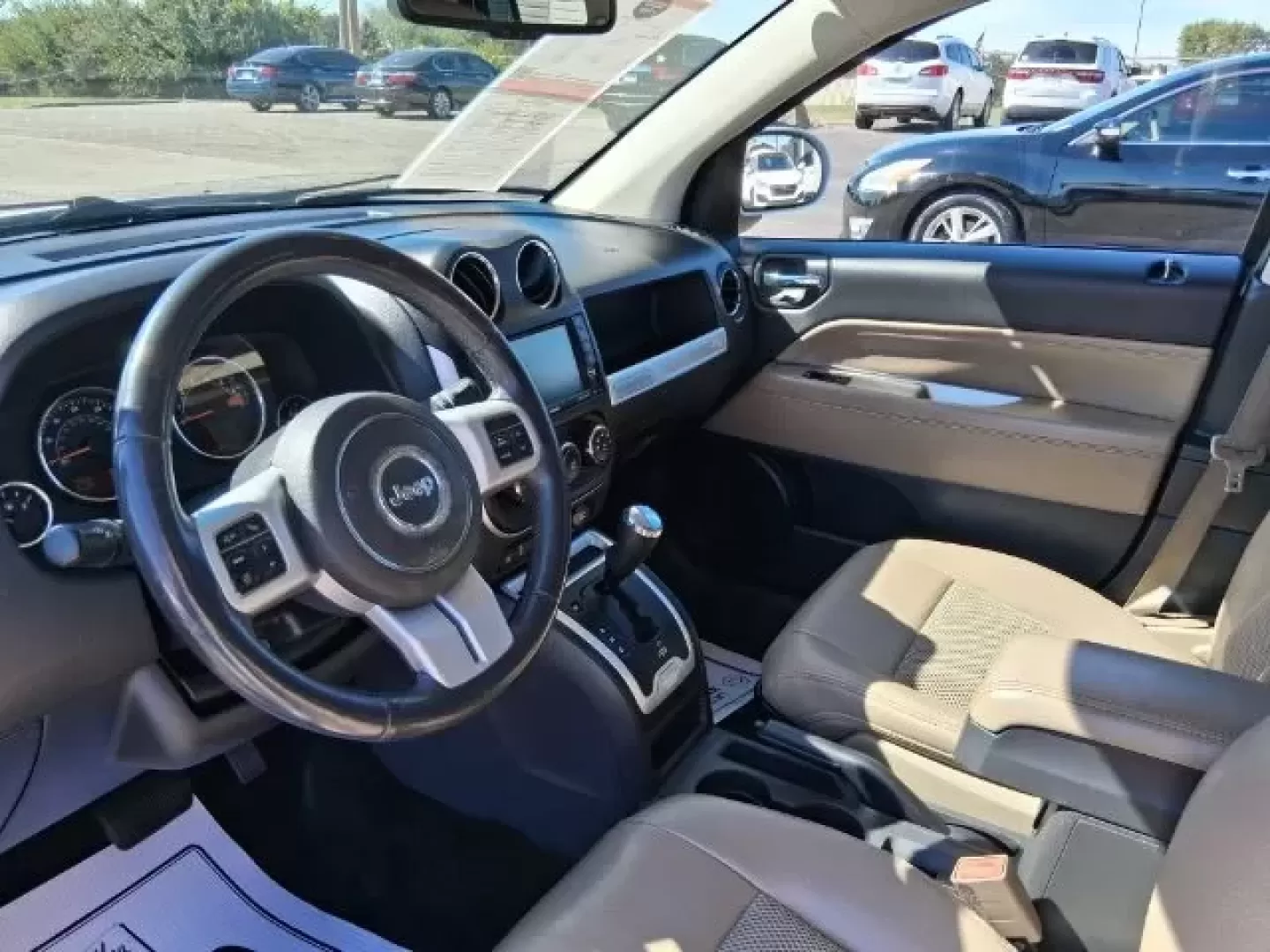 2014 Jeep Compass Latitude (1C4NJDEB0ED) with an 2.4L I-4 DOHC engine, located at 1865 W 2nd St., Xenia, OH, 45385, (937) 372-7777, 39.681259, -83.961945 - Discover your next adventure with the 2014 Jeep Compass Latitude, available now at Jamestown Auto Sales in Xenia, OH! This versatile SUV is not just a vehicle; it's an invitation to explore the open roads and embrace the lifestyle of your dreams. Whether you're a growing family looking for space, a - Photo#6