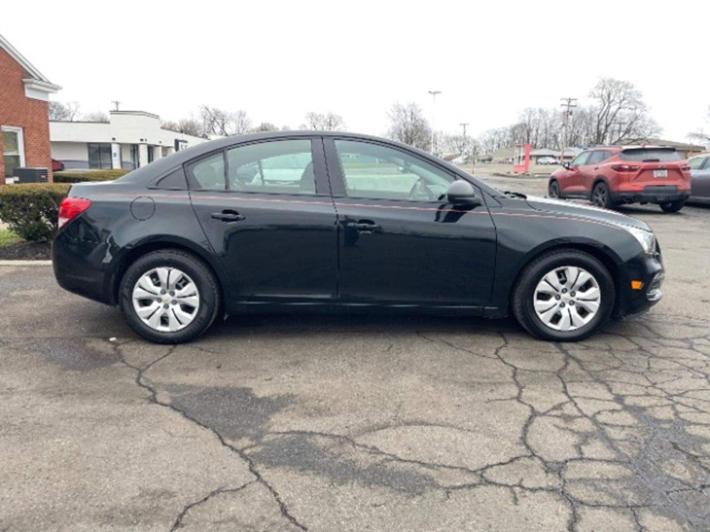2015 Black Granite Metallic Chevrolet Cruze LS Auto (1G1PA5SG2F7) with an ECOTEC 1.8L I-4 DOHC engine, located at 1865 W 2nd St., Xenia, OH, 45385, (937) 372-7777, 39.681259, -83.961945 - Photo#4
