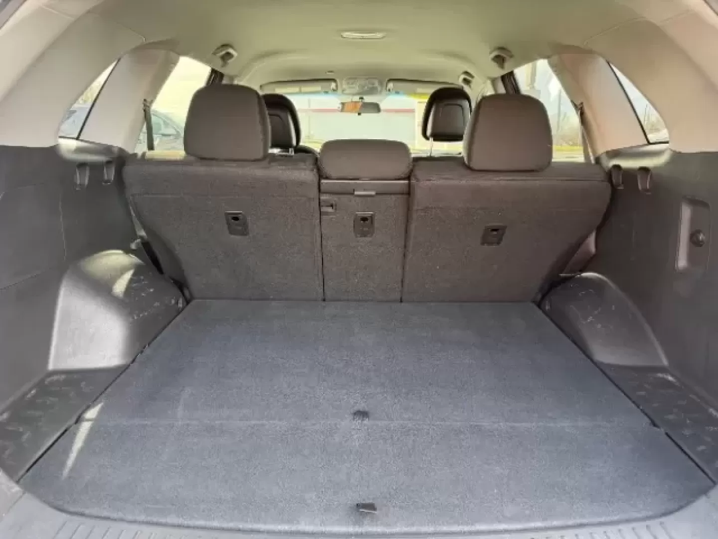 2014 Dark Cherry Kia Sorento LX (5XYKT3A65EG) with an 2.4L I-4 gasoline direct injection engine, located at 1865 W 2nd St., Xenia, OH, 45385, (937) 372-7777, 39.681259, -83.961945 - Photo#24