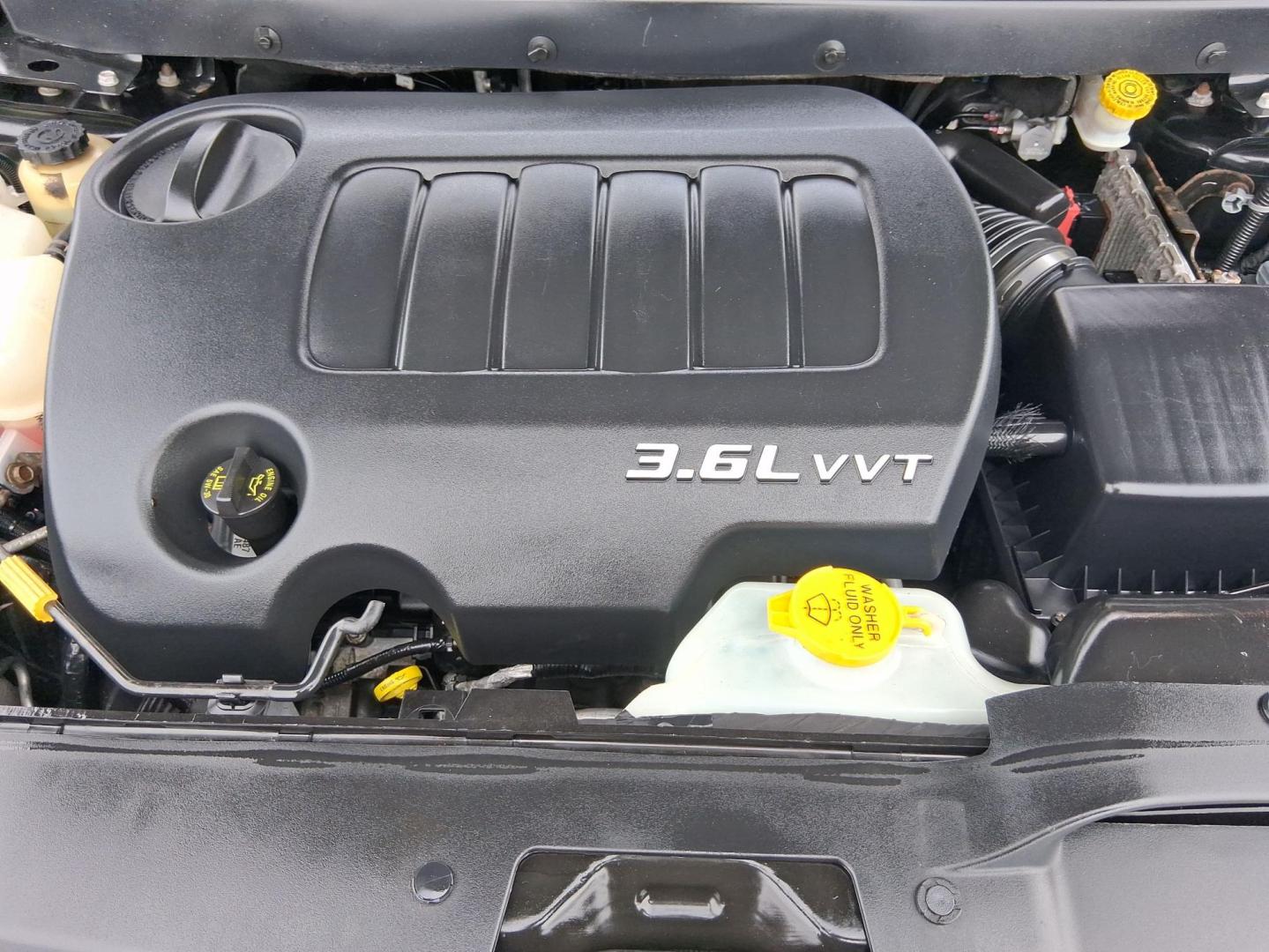 2012 Brilliant Black Crystal Pearlcoat Dodge Journey SXT (3C4PDDBGXCT) with an 3.6L V-6 DOHC engine, located at 1865 W 2nd St., Xenia, OH, 45385, (937) 372-7777, 39.681259, -83.961945 - Photo#10