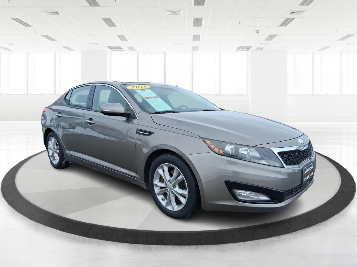 2013 Bright Silver Metallic /Black/Grey Kia Optima EX (5XXGN4A77DG) with an 2.4L I-4 gasoline direct injection engine, located at 1865 W 2nd St., Xenia, OH, 45385, (937) 372-7777, 39.681259, -83.961945 - Photo#0