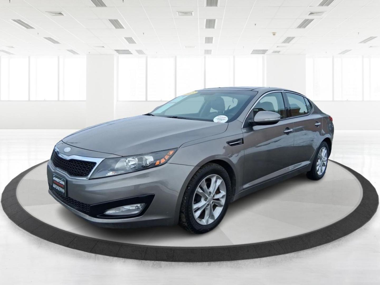 2013 Bright Silver Metallic /Black/Grey Kia Optima EX (5XXGN4A77DG) with an 2.4L I-4 gasoline direct injection engine, located at 1865 W 2nd St., Xenia, OH, 45385, (937) 372-7777, 39.681259, -83.961945 - Photo#1