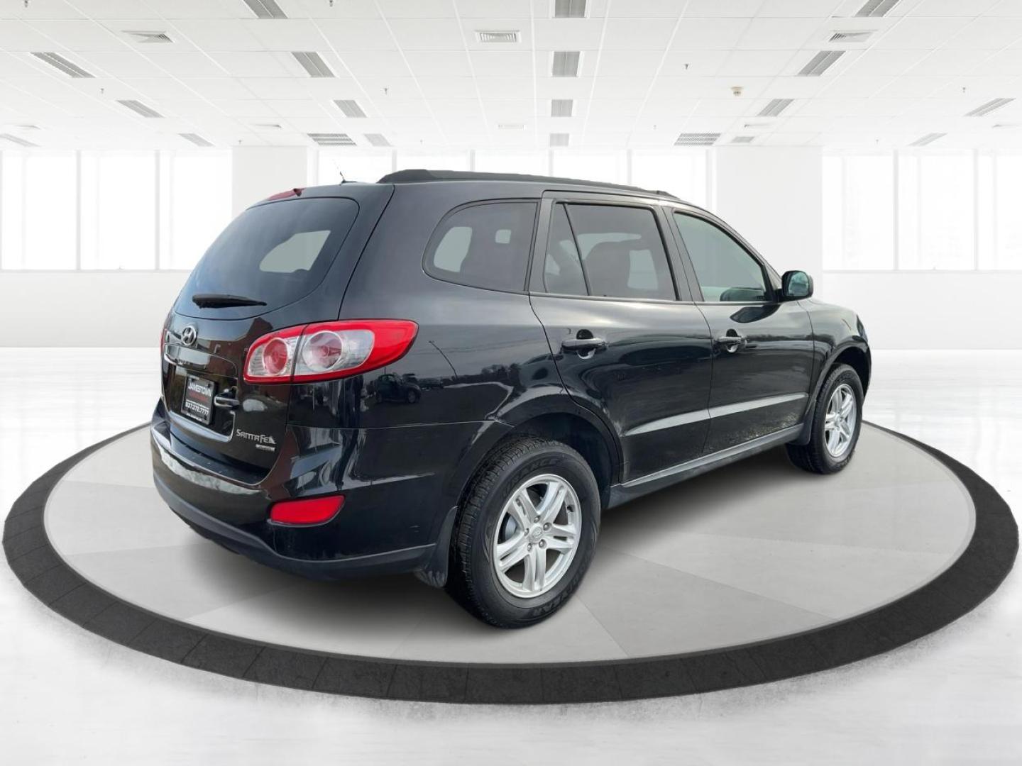 2011 Phantom Black Metallic /Grey Hyundai Santa Fe GLS (5XYZGDAB4BG) with an 2.4L I-4 DOHC engine, located at 1865 W 2nd St., Xenia, OH, 45385, (937) 372-7777, 39.681259, -83.961945 - Photo#4