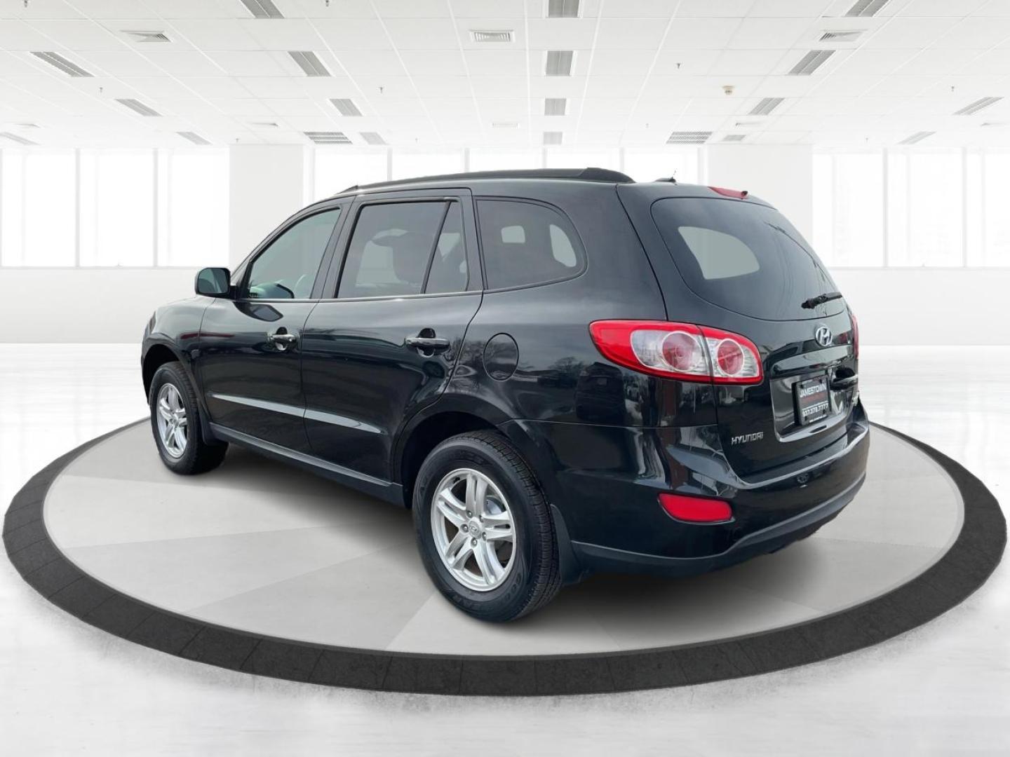 2011 Phantom Black Metallic /Grey Hyundai Santa Fe GLS (5XYZGDAB4BG) with an 2.4L I-4 DOHC engine, located at 1865 W 2nd St., Xenia, OH, 45385, (937) 372-7777, 39.681259, -83.961945 - Photo#5