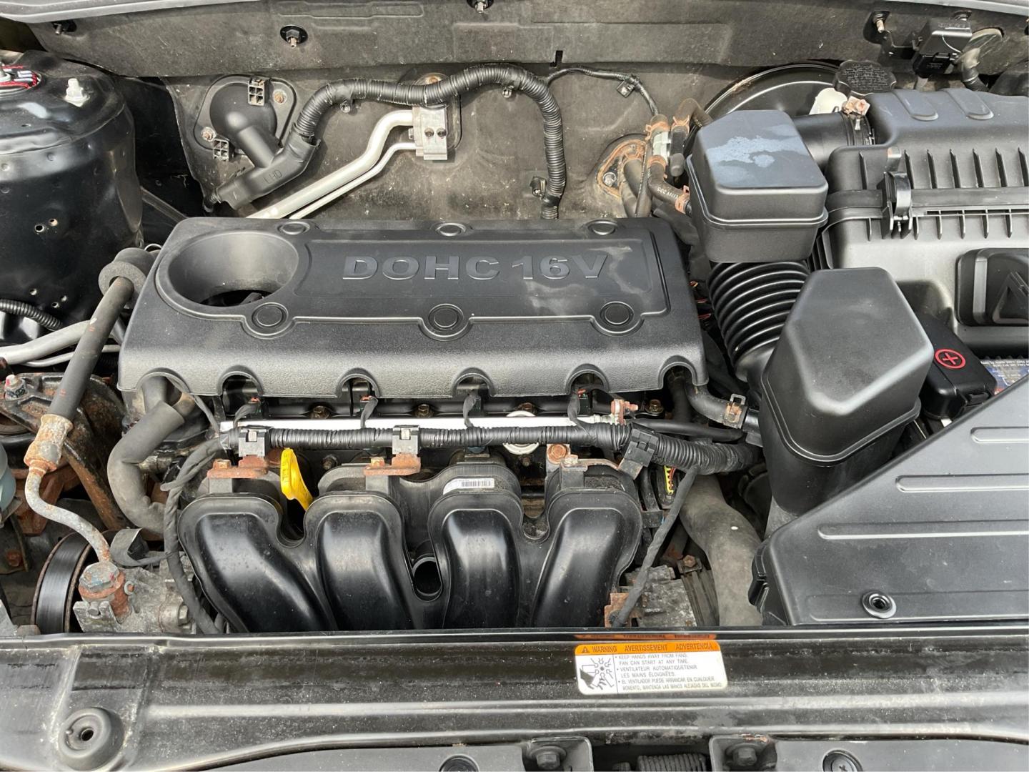 2011 Phantom Black Metallic /Grey Hyundai Santa Fe GLS (5XYZGDAB4BG) with an 2.4L I-4 DOHC engine, located at 1865 W 2nd St., Xenia, OH, 45385, (937) 372-7777, 39.681259, -83.961945 - Photo#9