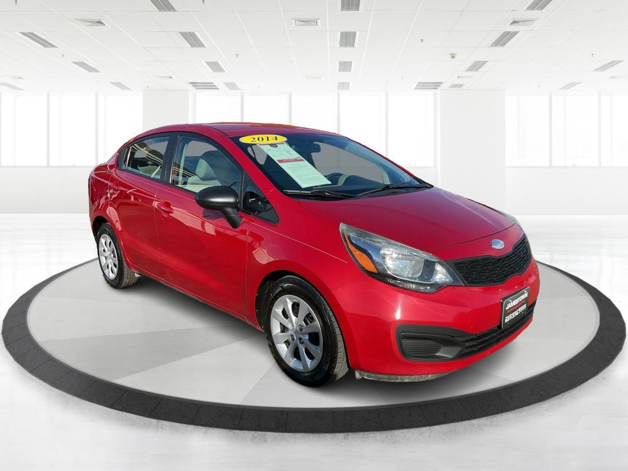 2014 Signal Red /Black/ Tan Kia Rio LX (KNADM4A31E6) with an 1.6L I-4 gasoline direct injection engine, located at 1865 W 2nd St., Xenia, OH, 45385, (937) 372-7777, 39.681259, -83.961945 - Photo#0