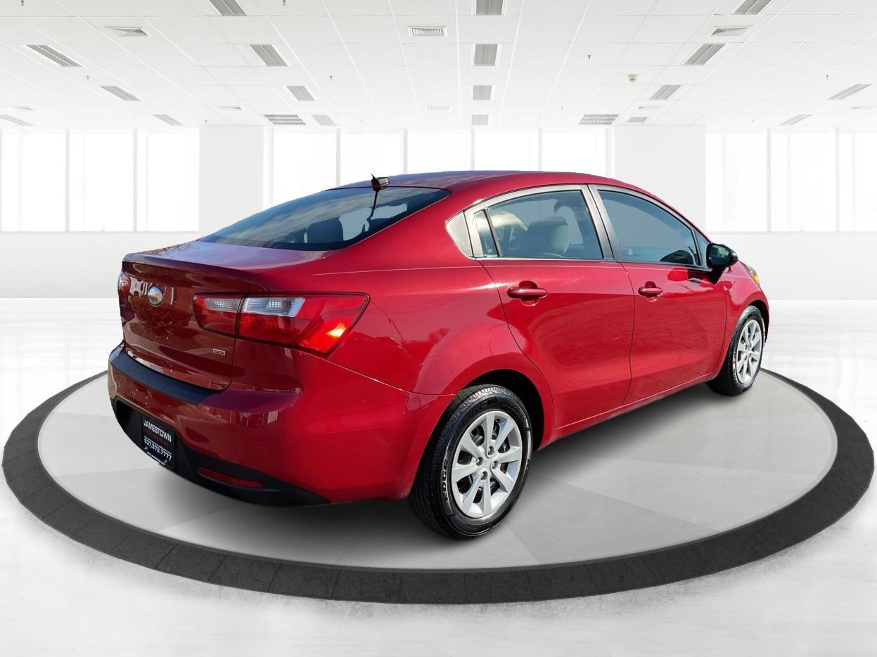 2014 Signal Red /Black/ Tan Kia Rio LX (KNADM4A31E6) with an 1.6L I-4 gasoline direct injection engine, located at 1865 W 2nd St., Xenia, OH, 45385, (937) 372-7777, 39.681259, -83.961945 - Photo#4