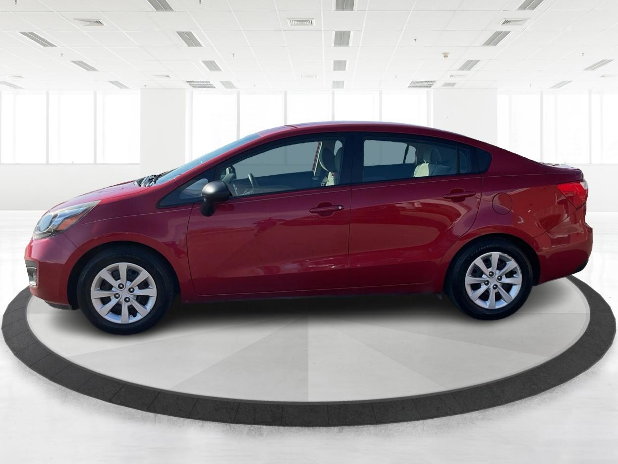 2014 Signal Red /Black/ Tan Kia Rio LX (KNADM4A31E6) with an 1.6L I-4 gasoline direct injection engine, located at 1865 W 2nd St., Xenia, OH, 45385, (937) 372-7777, 39.681259, -83.961945 - Photo#7