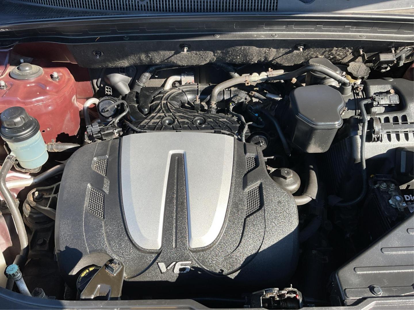 2011 Dark Cherry /Black/Tan Kia Sorento LX 4WD (5XYKTDA22BG) with an 3.5L V6 DOHC 24V engine, 6-Speed Automatic transmission, located at 1865 W 2nd St., Xenia, OH, 45385, (937) 372-7777, 39.681259, -83.961945 - Photo#10