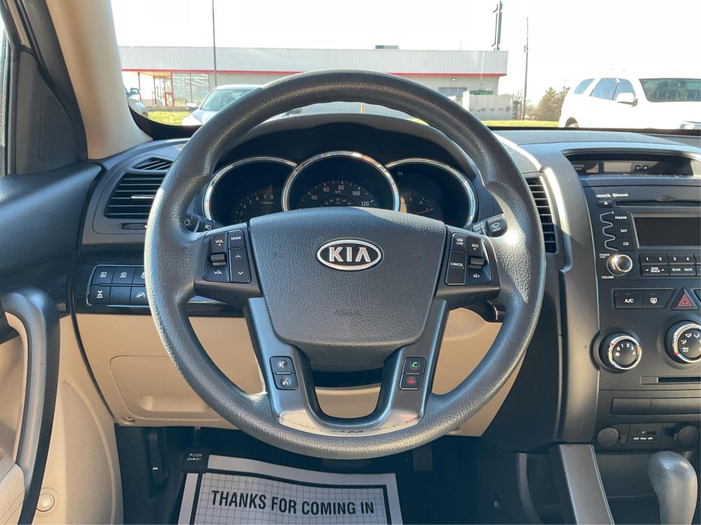 2011 Dark Cherry /Black/Tan Kia Sorento LX 4WD (5XYKTDA22BG) with an 3.5L V6 DOHC 24V engine, 6-Speed Automatic transmission, located at 1865 W 2nd St., Xenia, OH, 45385, (937) 372-7777, 39.681259, -83.961945 - Photo#15