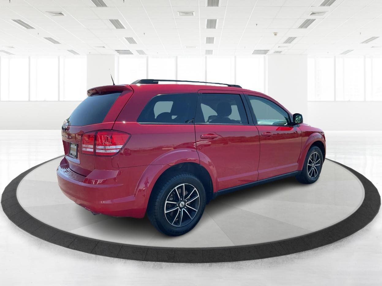 2018 Redline 2 Coat Pearl /Black Dodge Journey SE (3C4PDCAB1JT) with an Tigershark MultiAir 2.4L I-4 DOHC engine, located at 1865 W 2nd St., Xenia, OH, 45385, (937) 372-7777, 39.681259, -83.961945 - Photo#4