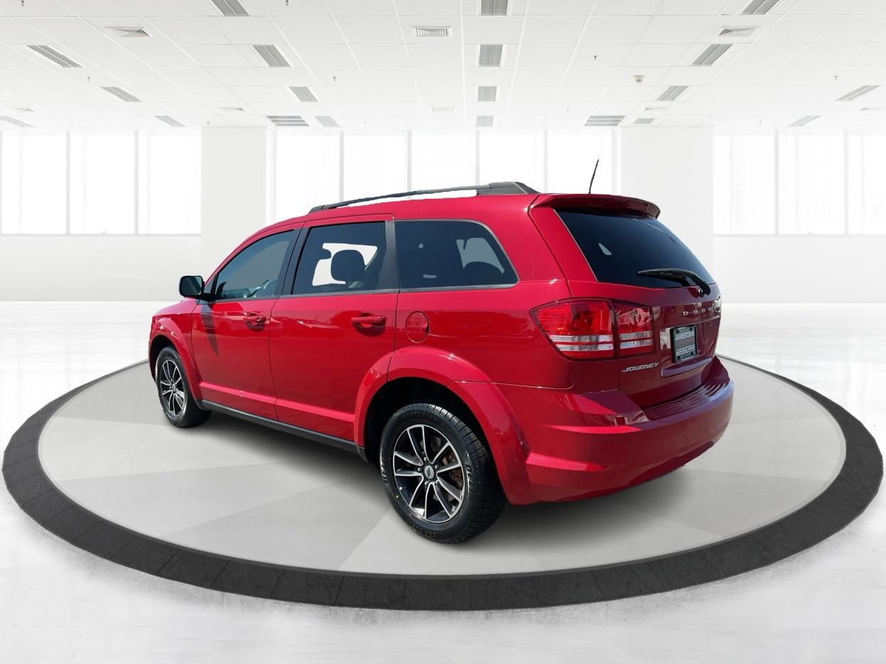 2018 Redline 2 Coat Pearl /Black Dodge Journey SE (3C4PDCAB1JT) with an Tigershark MultiAir 2.4L I-4 DOHC engine, located at 1865 W 2nd St., Xenia, OH, 45385, (937) 372-7777, 39.681259, -83.961945 - Photo#6