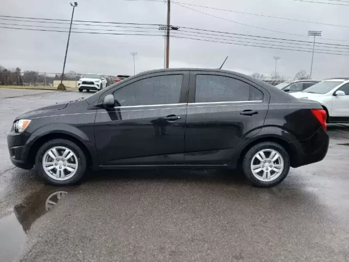 2013 Chevrolet Sonic LT Auto Sedan (1G1JC5SB6D4) with an 1.4L L4 DOHC 24V TURBO engine, 6-Speed Automatic transmission, located at 1865 W 2nd St., Xenia, OH, 45385, (937) 372-7777, 39.681259, -83.961945 - **Discover the Freedom of Adventure with the 2013 Chevrolet Sonic LT Sedan at Jamestown Auto Sales!** <br /> <br /> Are you ready to elevate your daily commute or embark on thrilling weekend getaways? Look no further than the 2013 Chevrolet Sonic LT Sedan, available at Jamestown Auto Sales, your tr - Photo#3