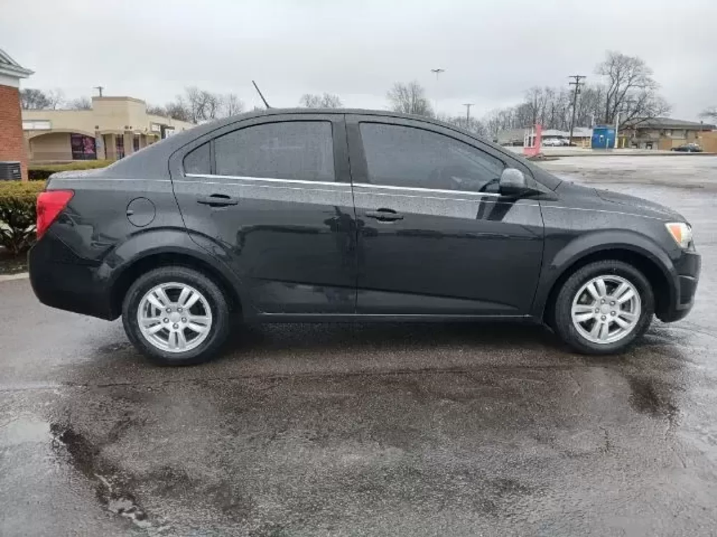 2013 Chevrolet Sonic LT Auto Sedan (1G1JC5SB6D4) with an 1.4L L4 DOHC 24V TURBO engine, 6-Speed Automatic transmission, located at 1865 W 2nd St., Xenia, OH, 45385, (937) 372-7777, 39.681259, -83.961945 - **Discover the Freedom of Adventure with the 2013 Chevrolet Sonic LT Sedan at Jamestown Auto Sales!** <br /> <br /> Are you ready to elevate your daily commute or embark on thrilling weekend getaways? Look no further than the 2013 Chevrolet Sonic LT Sedan, available at Jamestown Auto Sales, your tr - Photo#4