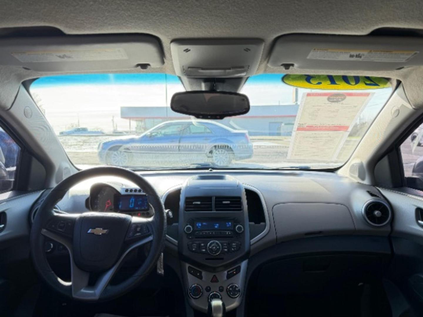 2013 Black Granite Metallic Chevrolet Sonic LT Auto Sedan (1G1JC5SB6D4) with an 1.4L L4 DOHC 24V TURBO engine, 6-Speed Automatic transmission, located at 1865 W 2nd St., Xenia, OH, 45385, (937) 372-7777, 39.681259, -83.961945 - Photo#7