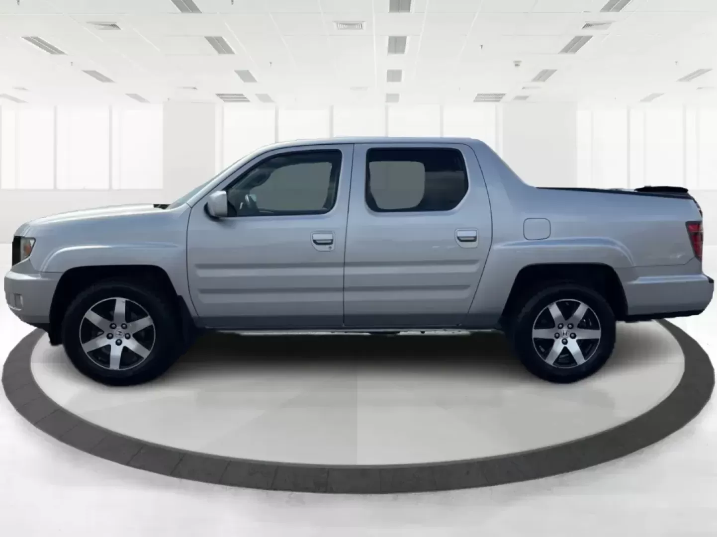 2014 Honda Ridgeline RTL-S (5FPYK1F67EB) with an 3.5L V6 SOHC 24V engine, 5-Speed Automatic transmission, located at 1865 W 2nd St., Xenia, OH, 45385, (937) 372-7777, 39.681259, -83.961945 - 2014 Honda Ridgeline RTL-S - Photo#6