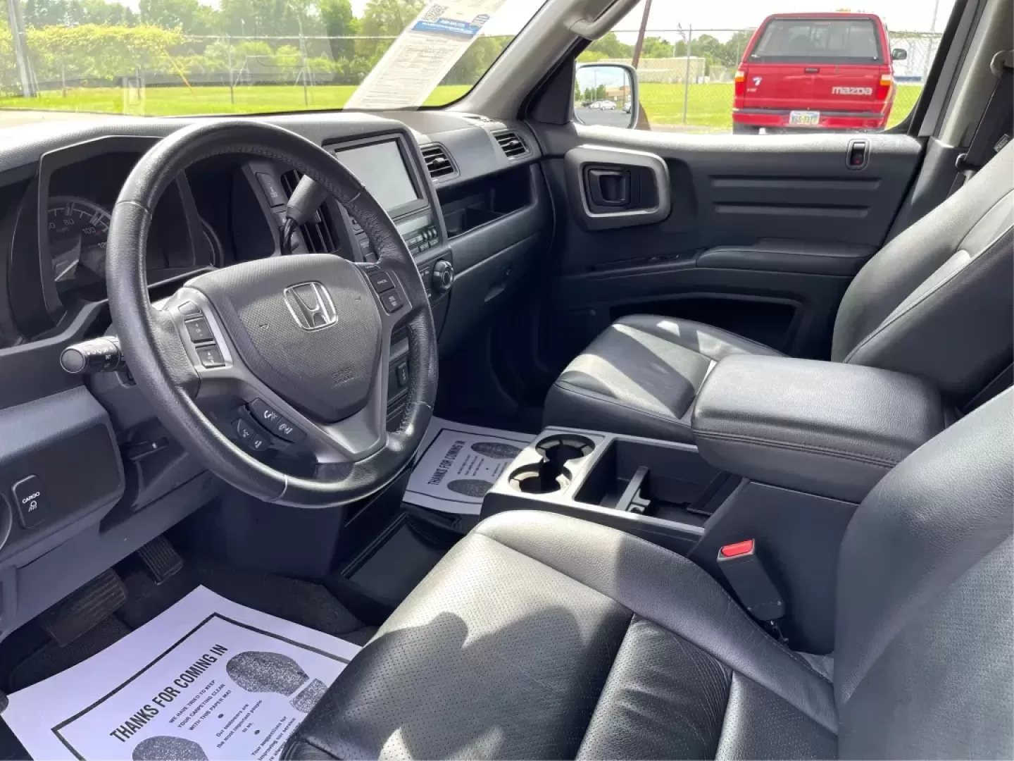 2014 Honda Ridgeline RTL-S (5FPYK1F67EB) with an 3.5L V6 SOHC 24V engine, 5-Speed Automatic transmission, located at 1865 W 2nd St., Xenia, OH, 45385, (937) 372-7777, 39.681259, -83.961945 - 2014 Honda Ridgeline RTL-S - Photo#9