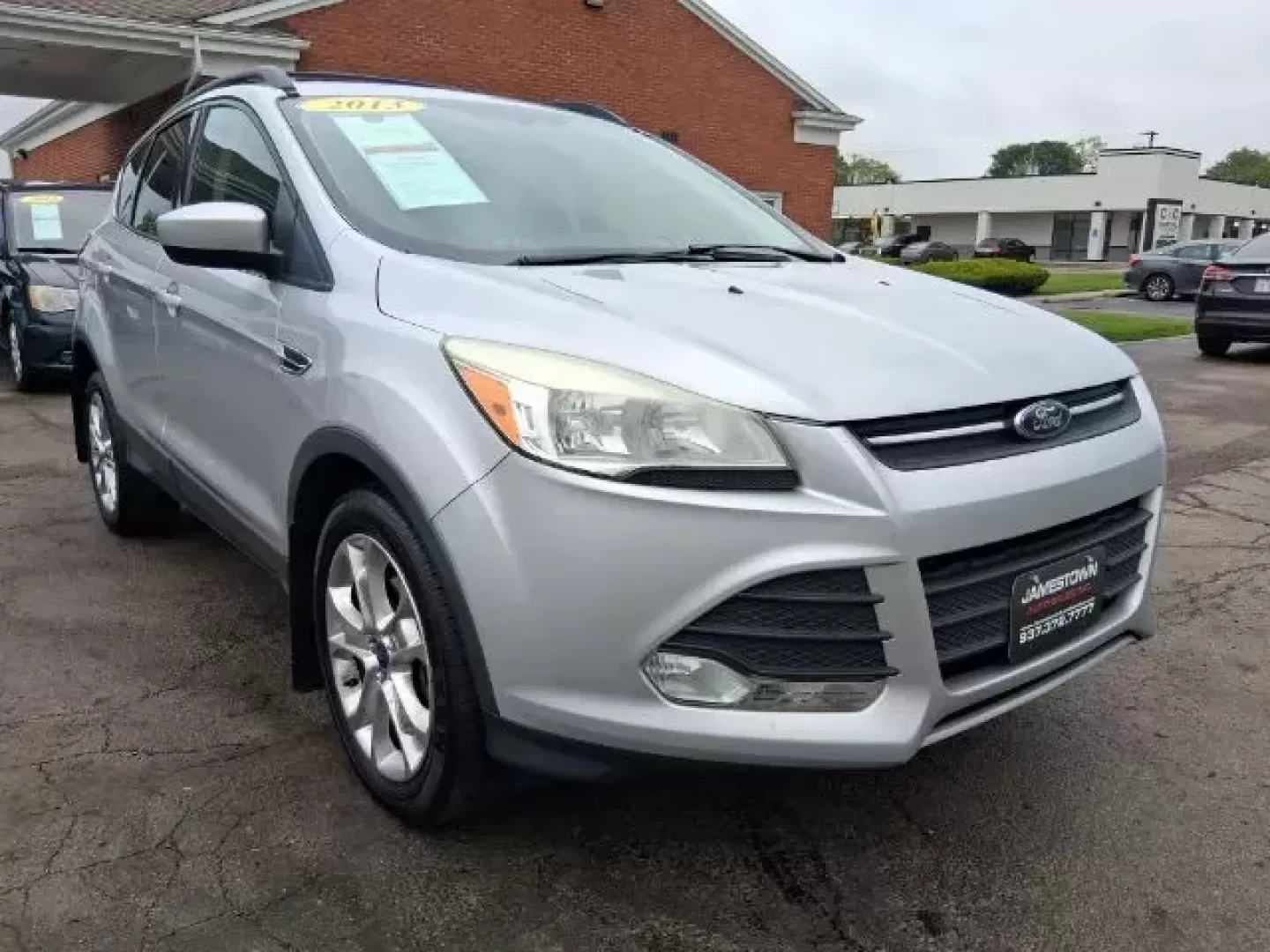 2013 Ford Escape SE 4WD (1FMCU9G9XDU) with an 2.0L L4 DOHC 16V engine, 6-Speed Automatic transmission, located at 1865 W 2nd St., Xenia, OH, 45385, (937) 372-7777, 39.681259, -83.961945 - ### Elevate Your Adventures with the 2013 Ford Escape SE 4WD at Jamestown Auto Sales!<br /> <br /> Are you ready to take your road trips, family outings, or daily commutes to the next level? Look no further! This **2013 Ford Escape SE 4WD** is the perfect blend of versatility, comfort, and reliabili - Photo#0