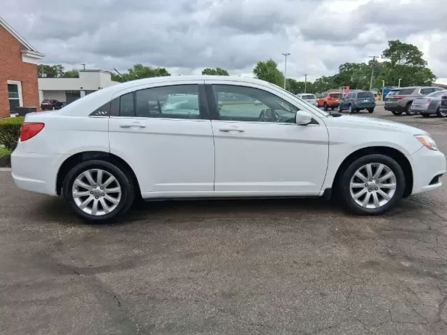2012 Chrysler 200 Touring (1C3CCBBB6CN) with an Other engine, located at 1865 W 2nd St., Xenia, OH, 45385, (937) 372-7777, 39.681259, -83.961945 - **Discover the Perfect Family Sedan at Jamestown Auto Sales!**<br /> <br /> If you're searching for a reliable vehicle that combines comfort, style, and safety, look no further than this 2012 Chrysler 200 Touring. Ideal for growing families or anyone needing a dependable commuter vehicle, this sedan - Photo#7