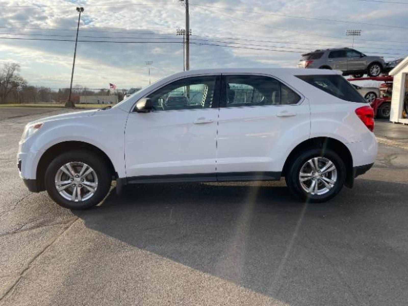 2015 Summit White Chevrolet Equinox LS 2WD (2GNALAEK4F1) with an 2.4L L4 DOHC 16V FFV engine, 6-Speed Automatic transmission, located at 1865 W 2nd St., Xenia, OH, 45385, (937) 372-7777, 39.681259, -83.961945 - Photo #2