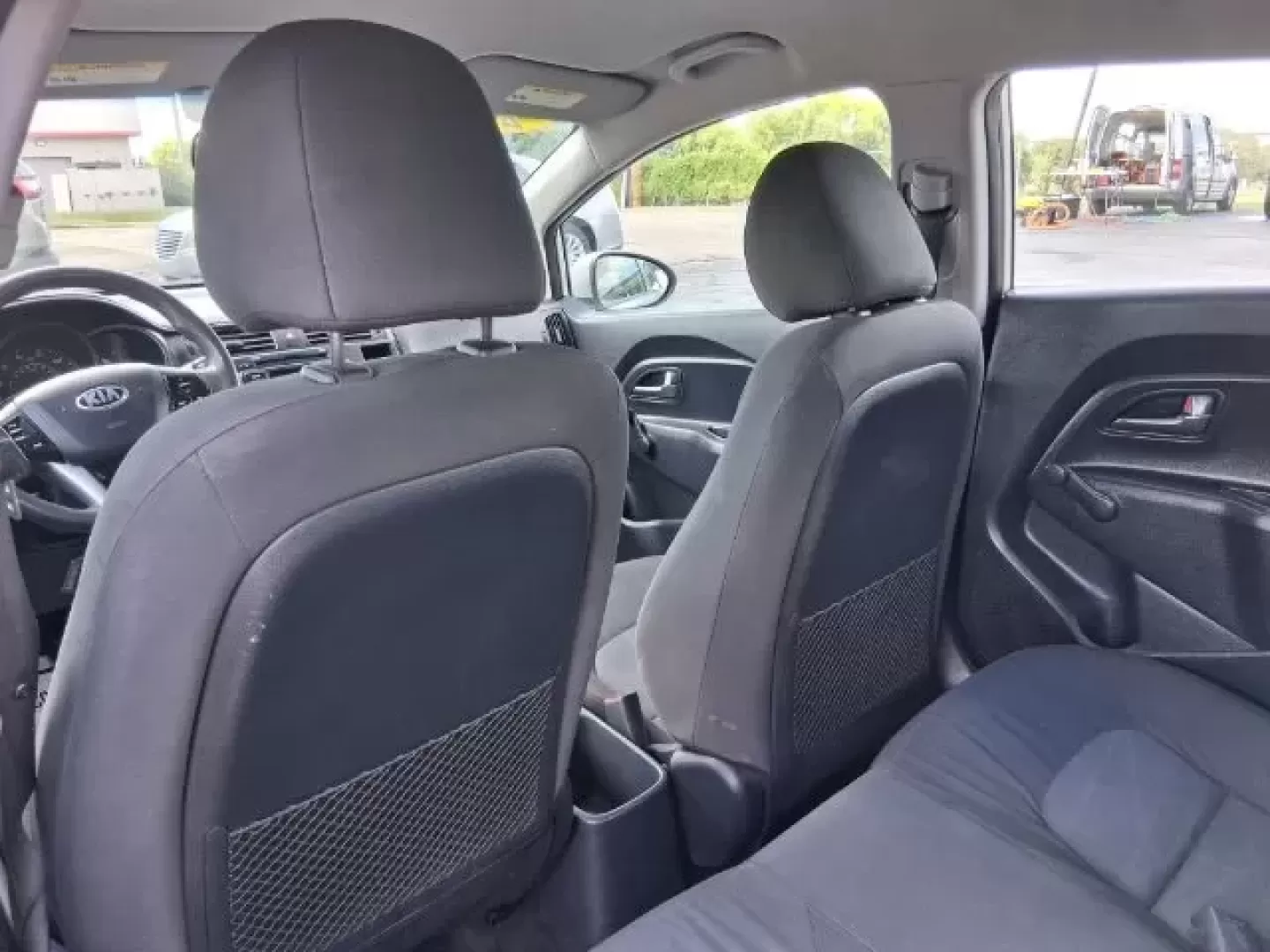 2015 Kia Rio LX (KNADM4A30F6) with an Gamma 1.6L I-4 gasoline direct injection engine, located at 1865 W 2nd St., Xenia, OH, 45385, (937) 372-7777, 39.681259, -83.961945 - **Discover the Perfect Commuter Sedan at Jamestown Auto Sales in Xenia!**<br /> <br /> Are you on the hunt for a reliable and budget-friendly vehicle that fits perfectly into your busy lifestyle? Meet the 2015 Kia Rio LX, a sedan designed to blend comfort, efficiency, and style, making it a fantasti - Photo#9
