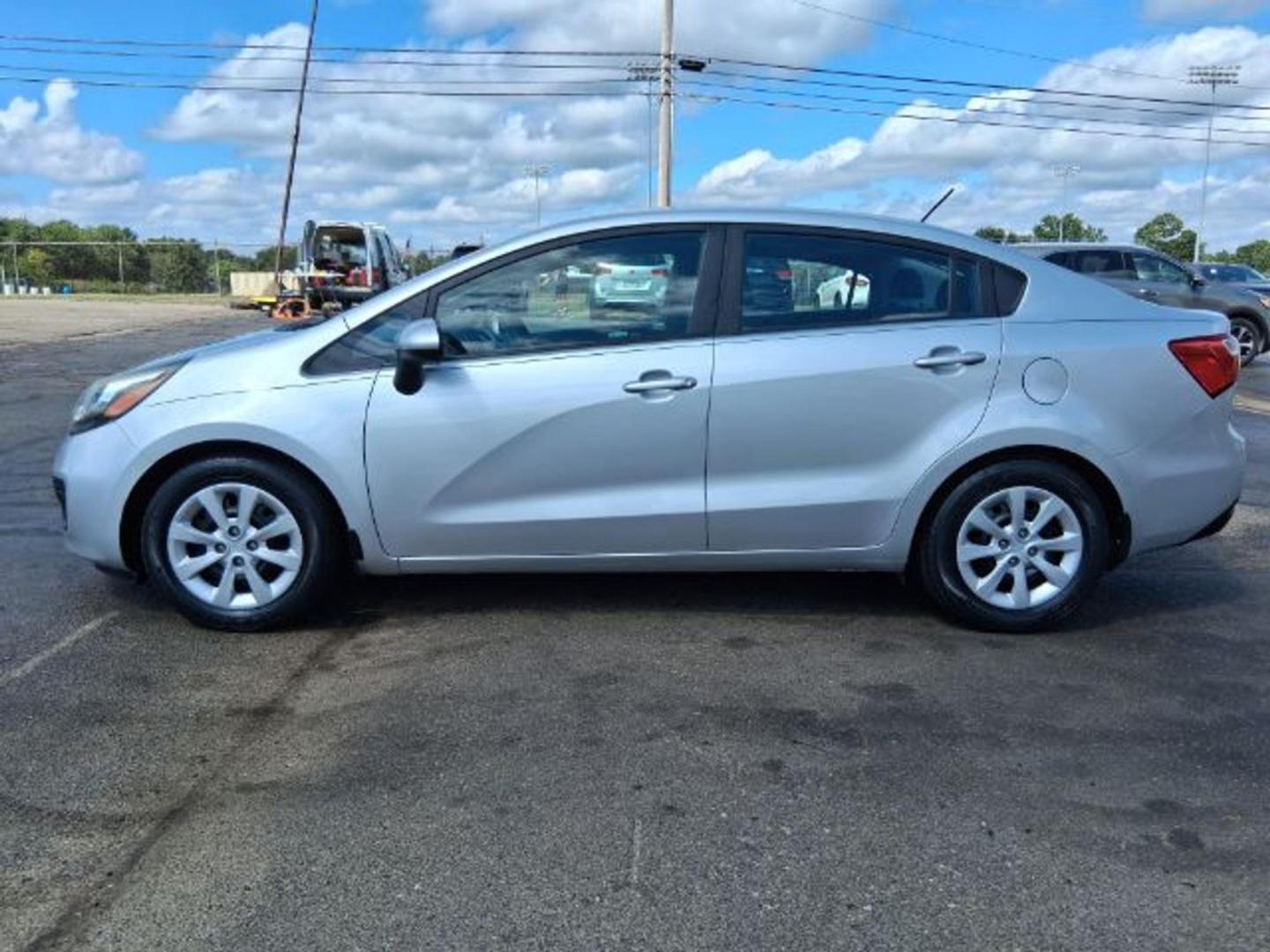 2015 Bright Silver Kia Rio LX (KNADM4A30F6) with an Gamma 1.6L I-4 gasoline direct injection engine, located at 1865 W 2nd St., Xenia, OH, 45385, (937) 372-7777, 39.681259, -83.961945 - Photo#2